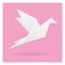 White bird paper craft flying in frame art isolated on pink back
