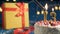 White birthday cake number 13 golden candles burning by lighter, blue background with lights and gift yellow box tied up with red