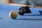 White and black billiard balls in a pool table