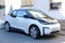 white, black compact city car i3, first mass-produced electric car German company BMW, concept minimizing environmental impact,