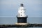 The white and black lighthouse near Cape Henlopen, Lewes, Delaware, U.S.A