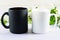 White and black mug mockup with apple blossom