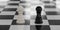 White and black pawn figures on a checker board background antagonist rivalry conflict concept 3d render illustration