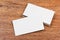 White blank business cards on wooden background.close-up