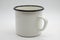 White blank enamel mug isolated on white background