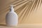 White blank packaging cosmetic bottle with shadow of palm leaves