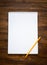 White blank papers in a copybook with pen on the