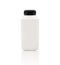White blank plastic fresh milk bottle with black cap isolated on white