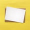 White Blank Postcard and Brown Envelope on Yellow