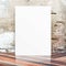 White Blank Poster in crack cement wall and diagonal wooden floor room,Template Mock up for your content,Business presentation