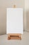White blank stretched canvas mockup on easel