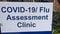 White and blue, covid-19 , flu assessment sign in australia