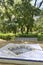 White and blue fountain in garden