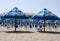 White and Blue Fringed Beach Umbrellas