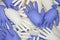 White and blue medical latex gloves background