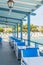 White and blue tables in the beach cafe of the Mediterranean resort