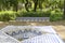 White blue tiles fountain and bench