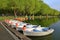 White boats and orange catamarans in a row. Pyatigorsk, Russia