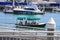 White boats and yachts at the docks in the harbor with deep blue ocean water and blue sky at Burton Chace Park