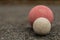 White Bocce Ball with Red Ball Close Copy Space Left