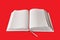 White book on red plate