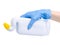 White bottle toilet cleaner in cleaning glove hand