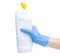 White bottle toilet cleaner in cleaning glove hand