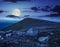 White boulders on the hillside at night