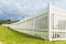 White Boundary Vertical Slat Fence