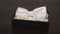 White bow tie, Bow tie in a box, bow tie on a table, wedding, feast, tie a satin bow tie