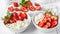 White bowl with fresh red ripe strawberries and natural cottage cheese