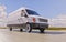 White Brandless Commercial Van on the Road Motion Blurred 3d Illustration