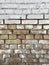 White bricks stand over reddish, beige, industrial bricks and are a keen backdrop - BACKGROUND
