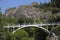 White bridge over mountain rivers