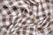 White and brown checked fabric