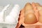 White and brown eggs in package. Chicken eggs in carton cells