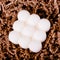 White bubble cube candles on the brown paper background