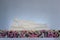 White Buddha statue lying on stand