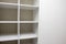 White built-in wardrobe with shelves