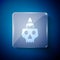 White Burning candle on a skull icon isolated on blue background. Day of dead. Square glass panels. Vector