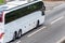 White bus coach on uk motorway in fast motion