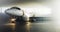 White business private jet airplane parked at aircraft hangar. Luxury tourism and business travel transportation concept