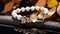 White Butterfly Bracelet With Gold Bow And Leaves