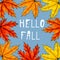 White calligraphy inscription Hello fall surrounded by yellow, orange and red maple leaves. Hand lettering in the middle