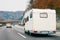 White Camper rv in road on highway