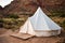 White camping tent in the desert