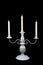 White candlestick with three candles