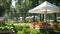 a white canopy tent, with crates of fresh strawberries, surrounded by other booths showcasing a variety of products and