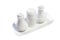 White caramic saltshaker and pepper container