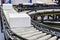 White cardboard boxes on conveyor belt industrial